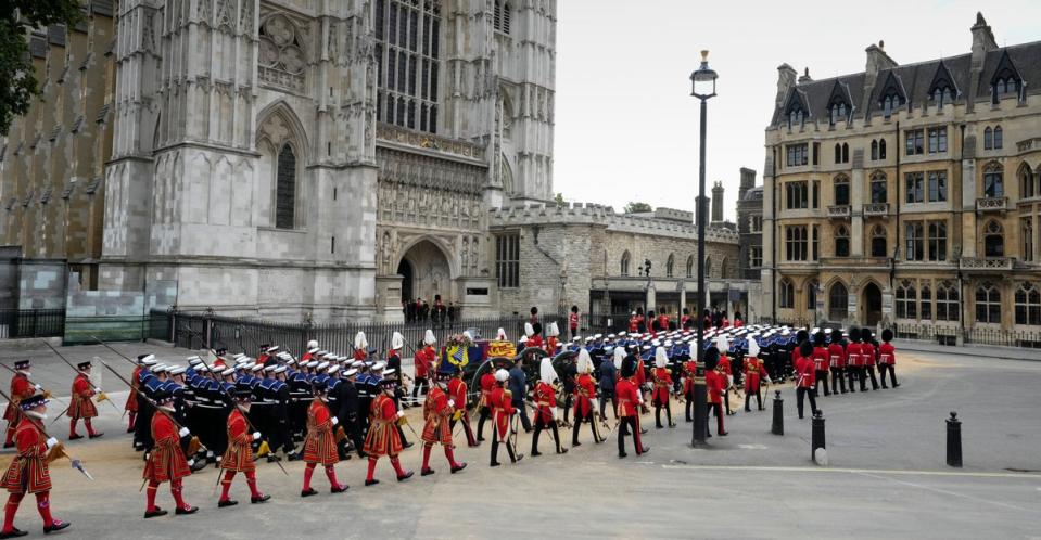 The coffin of Queen Elizabeth II arrives on a gun carriage at Westminster Abbey (AP)