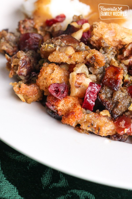 <p>Favorite Family Recipes</p><p>This Cranberry Sausage Stuffing is a sweet and savory stuffing that's always a Thanksgiving favorite.</p><p><strong>Get the recipe</strong>: <a href="https://www.favfamilyrecipes.com/cranberry-sausage-stuffing/" rel="nofollow noopener" target="_blank" data-ylk="slk:Cranberry-Sausage Stuffing;elm:context_link;itc:0;sec:content-canvas" class="link rapid-noclick-resp"><strong>Cranberry-Sausage Stuffing</strong></a></p>