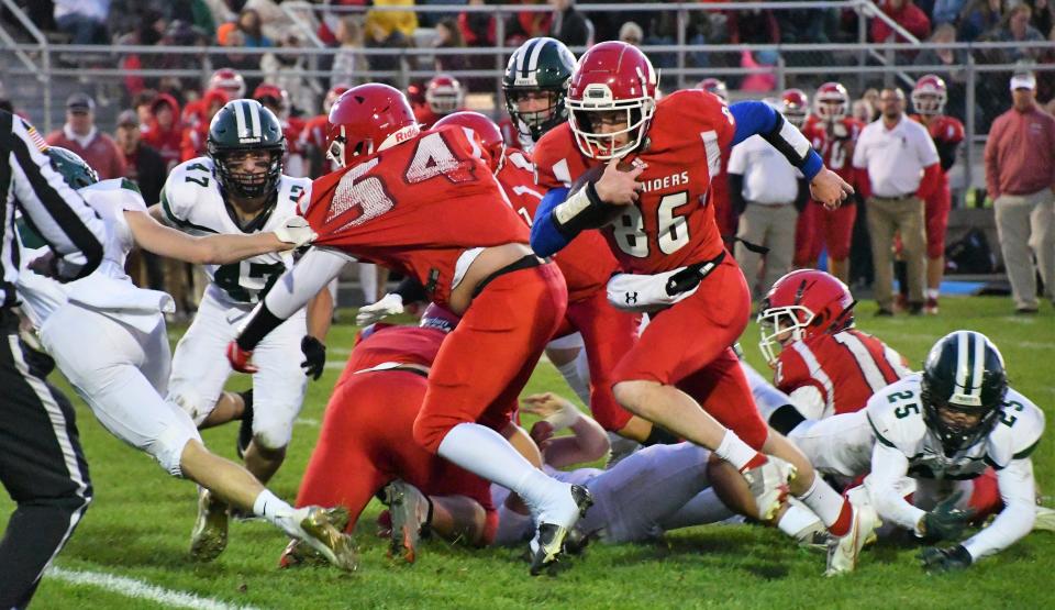 Spaulding’s Emmett Colby (86), shown here in Week 4's game against Dover, scored two touchdowns and ran for 177 yards in Friday's 27-26 loss at Manchester Memorial.