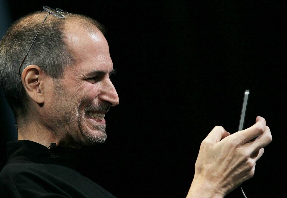 SAN FRANCISCO - JUNE 07: (FILE PHOTO) Apple CEO Steve Jobs demonstrates the new iPhone 4 as he delivers the opening keynote address at the 2010 Apple World Wide Developers conference June 7, 2010 in San Francisco, California. Steve Jobs announced on January 17, 2011 that the Apple board has granted him a medical leave of absence. (Photo by Justin Sullivan/Getty Images)