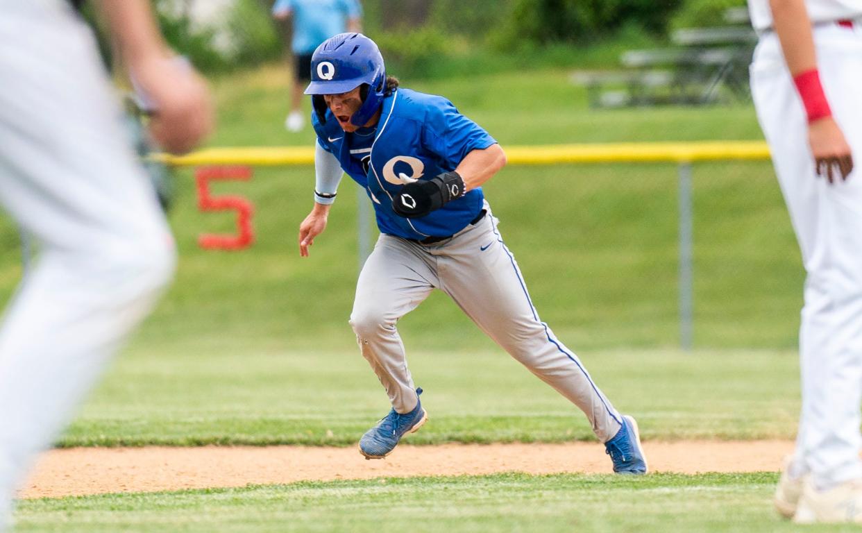 Quakertown senior Danny Qualteria (2) runs to third base during a 3-0 victory over Hatboro-Horsham.