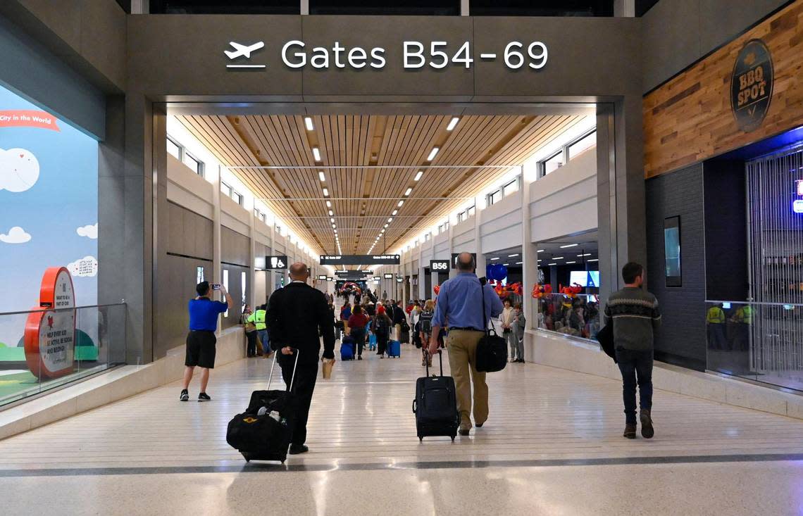 Travelers began departing and arriving from the new $1.5 billion single terminal at Kansas City International Airport after it opened Tuesday.