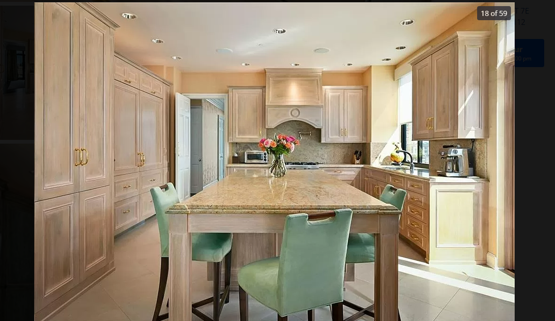 The kitchen at 433 Ward Parkway, Unit 7E. This Kansas City penthouse overlooking the Plaza is listed for $4.4 million. Screenshot from Zillow. March 7, 2024.