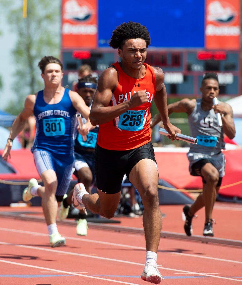 Palmyra's Anthony Mansfield anchors the Cougars to a gold medal in the 3A 4x100-meter relay at the PIAA District 3 Track and Field Championships on Saturday, May 21, 2022, at Shippensburg University. 