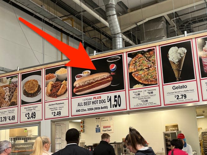 All-beef hot dog on food court sign with a red arrow pointing to it at UK Costco