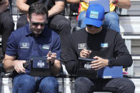 Jimmie Johnson, left, and Alex Palou, of Spain, look at rings during the drivers meeting for the Indianapolis 500 auto race at Indianapolis Motor Speedway, Saturday, May 28, 2022, in Indianapolis. (AP Photo/Darron Cummings)