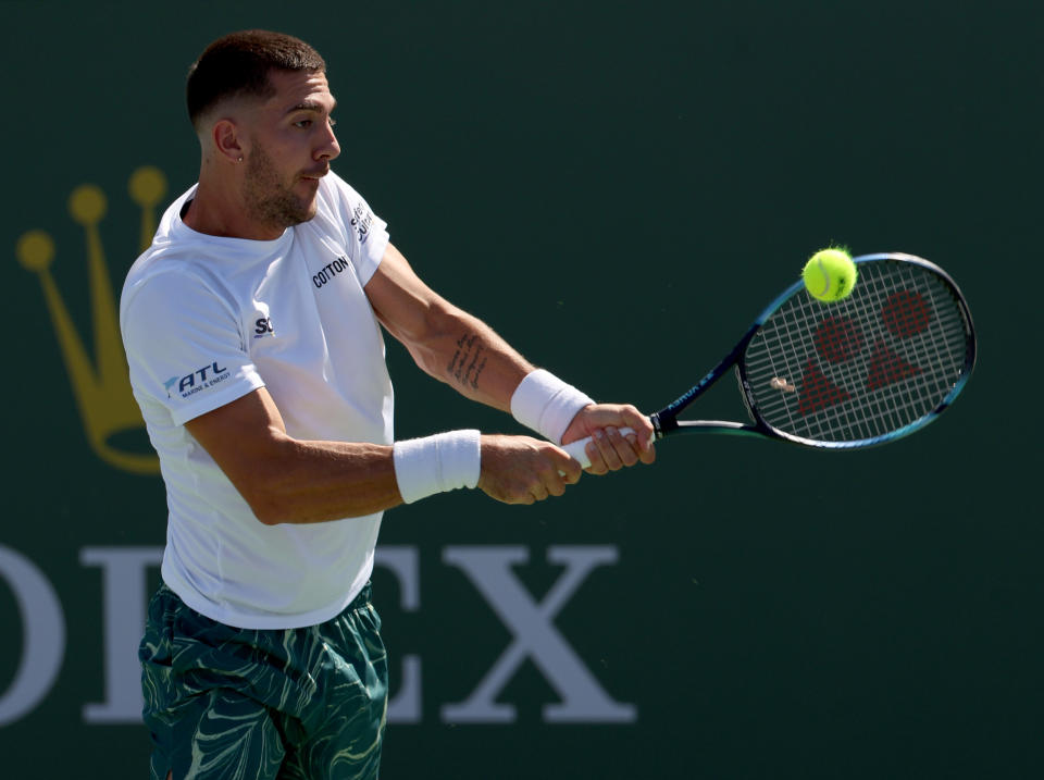 Thanasi Kokkinakis, pictured here in action against Brandon Holt at Indian Wells.