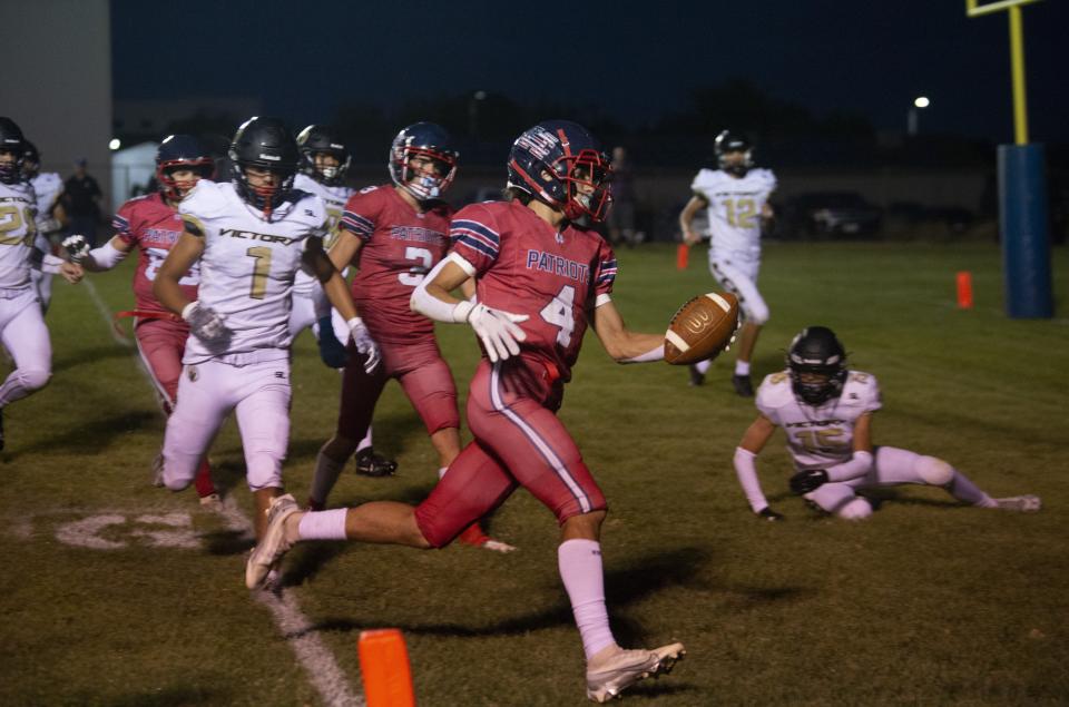 Hesperia Christian’s Ayden Ortega scores a touchdown during the second quarter against Victory Christian Academy on Friday, Sept. 1, 2023.