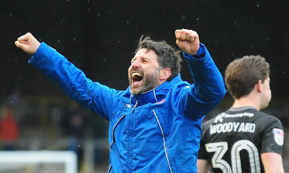 Danny Cowley celebrates Lincoln City’s 1-0 win at Carlisle United on Easter Monday, with midfielder Alex Woodyard behind him