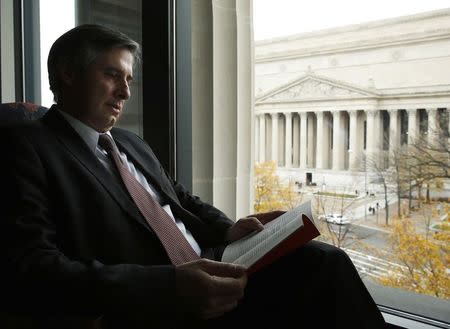 Attorney Jonathan Franklin reads a U.S. Supreme Court brief at the Norton Rose Fulbright & Jaworski law firm in Washington November 25, 2014. REUTERS/Gary Cameron
