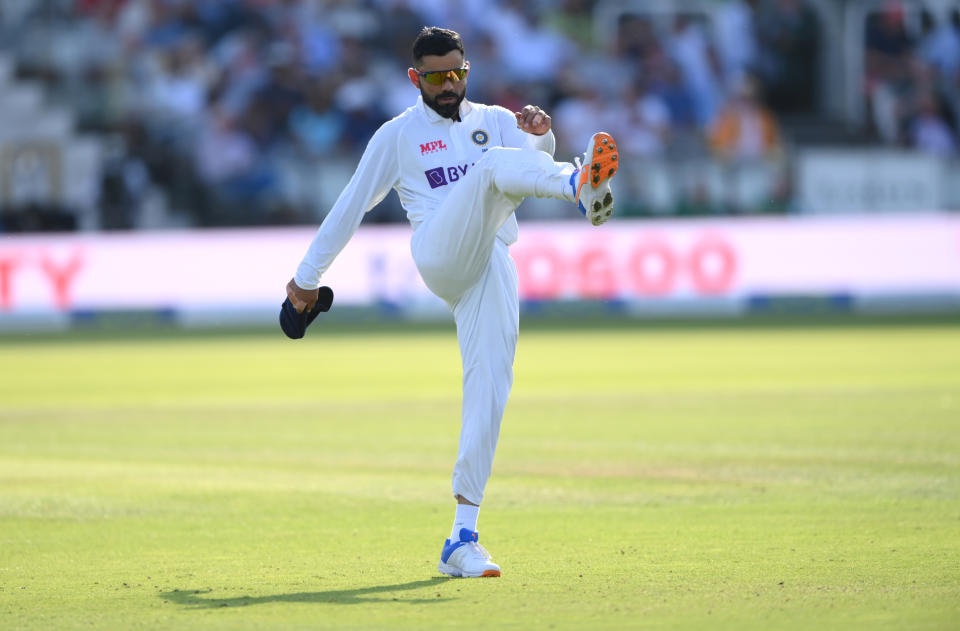 LONDON, ENGLAND - AUGUST 14: India captain Virat Kohli reacts after a review against Joe Root for LBW goes against them during day three of the Second Test Match between England and  India at Lord's Cricket Ground on August 14, 2021 in London, England. (Photo by Stu Forster/Getty Images)