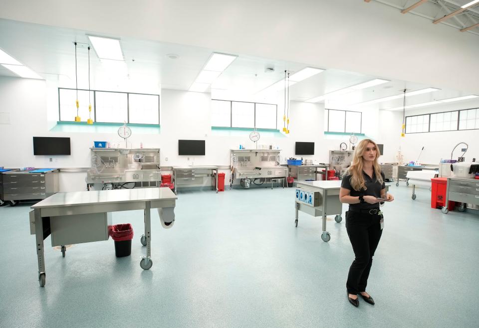 An official stands in the main autopsy room of the new Volusia County medical examiner's office on Jan. 19, 2024.