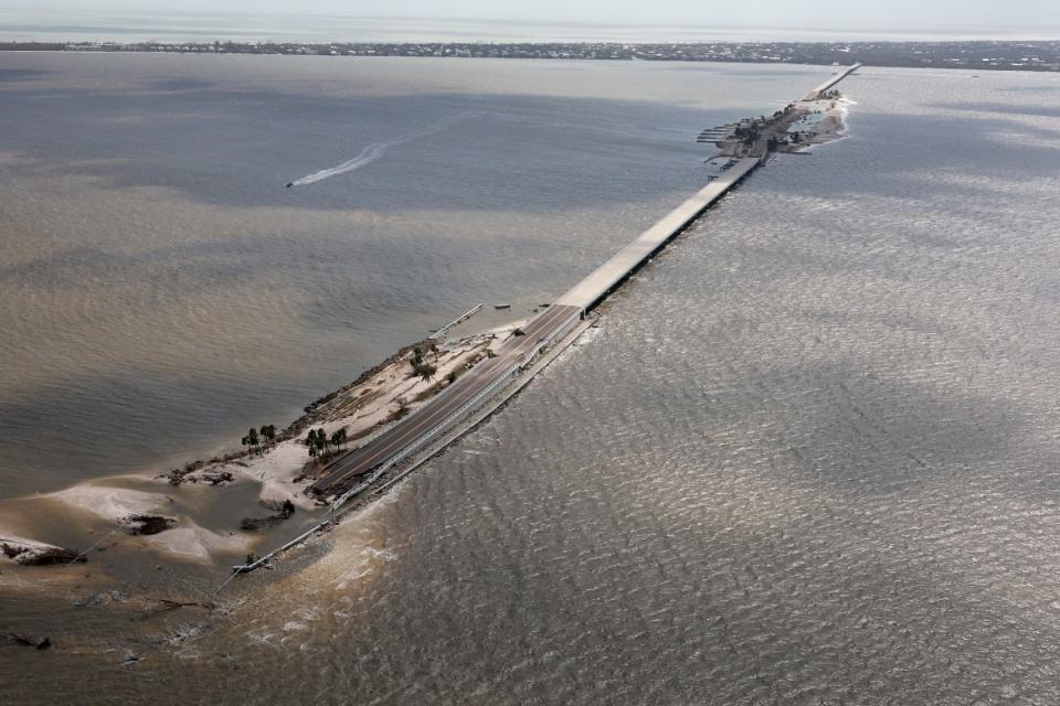 <div class="inline-image__caption"><p>Parts of Sanibel Causeway were washed away along with sections of the bridge, cutting off Sanibel Island.</p></div> <div class="inline-image__credit">Joe Raedle/Getty</div>