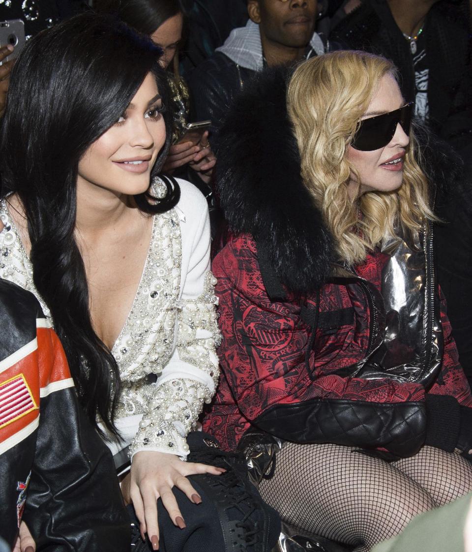 Kylie Jenner, left, and Madonna attend the Philipp Plein show during Fashion Week on Monday, Feb. 13, 2017 in New York. (Photo by Charles Sykes/Invision/AP)