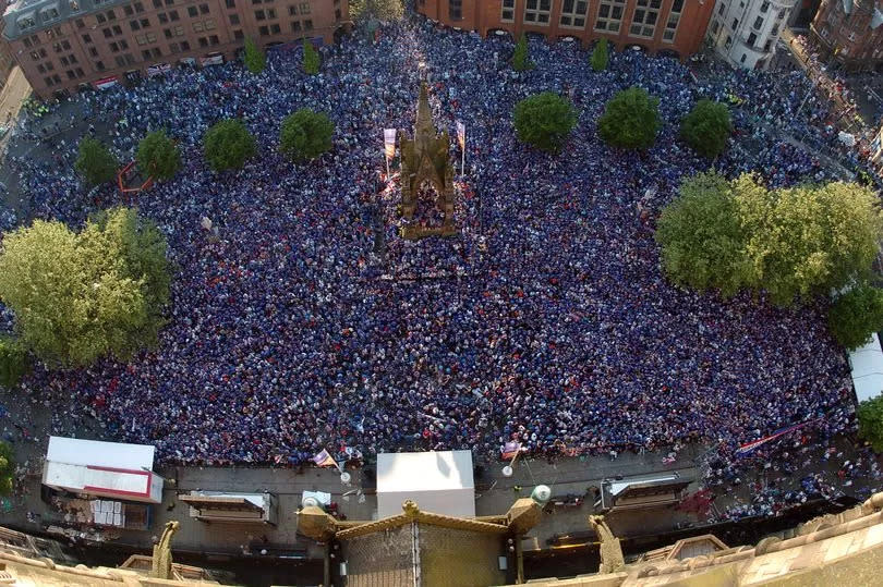 Rangers fans in Albert Square -Credit:Daily Record