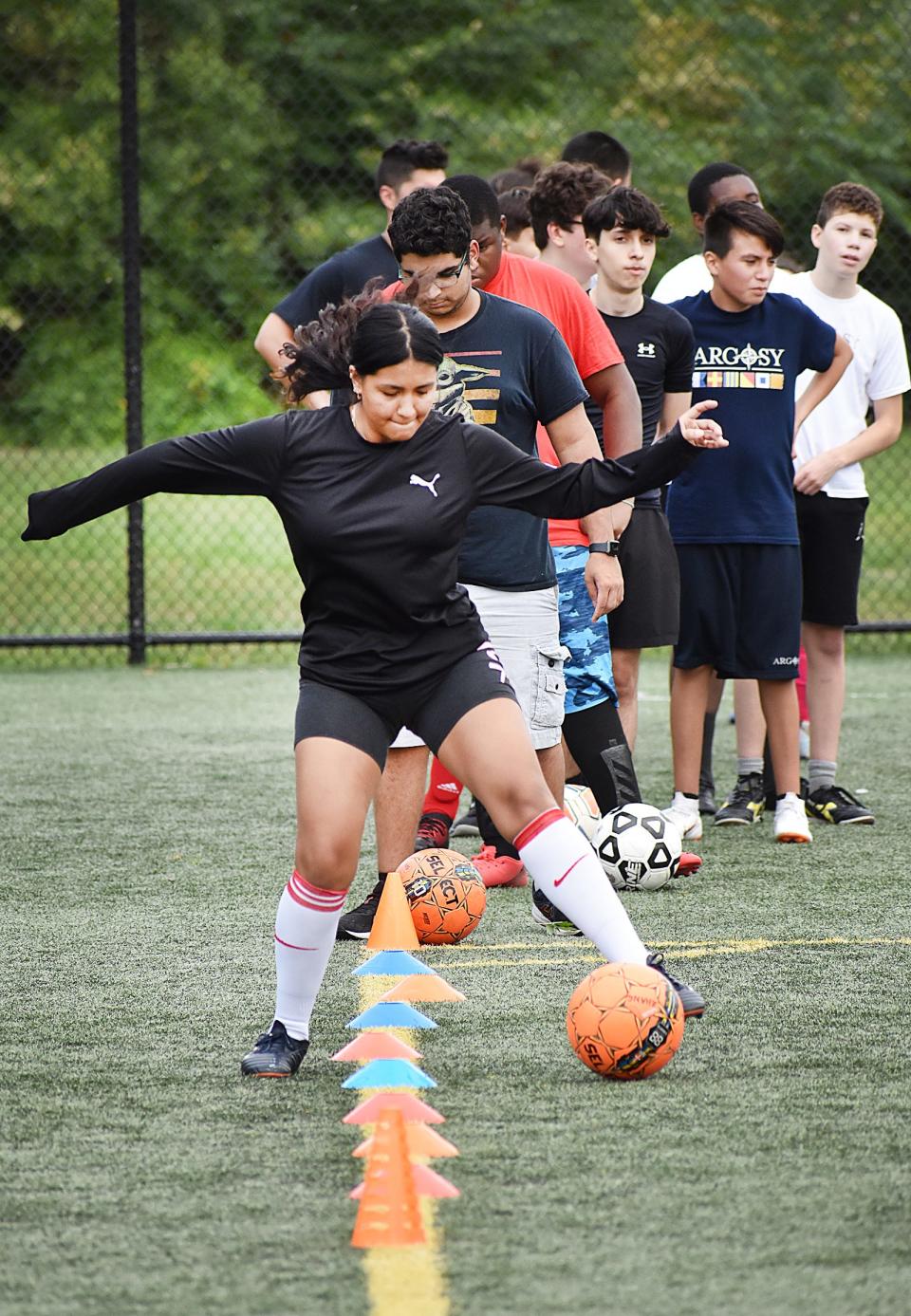 The Argosy Charter School boys and girls soccer teams run through drills at Britland Park in Fall River on Wednesday, Sept. 7, 2022.