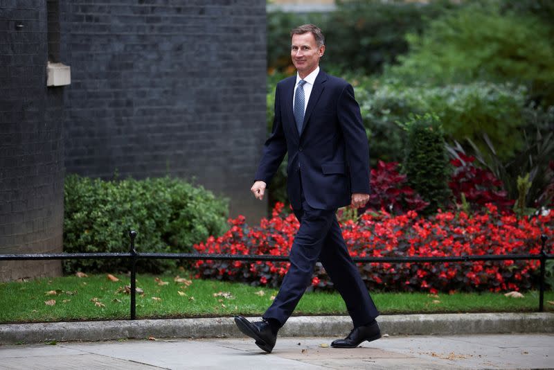 FILE PHOTO: MP Jeremy Hunt walks outside Downing Street in London