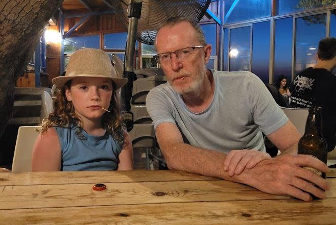 Emily Hand, 8, is seen with her father Thomas Hand in a family photo. / Credit: Courtesy of Thomas Hand