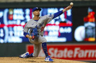 Los Angeles Dodgers starting pitcher Andrew Heaney throws to a Minnesota Twins batter during the first inning of a baseball game Tuesday, April 12, 2022, in Minneapolis. (AP Photo/Nicole Neri)