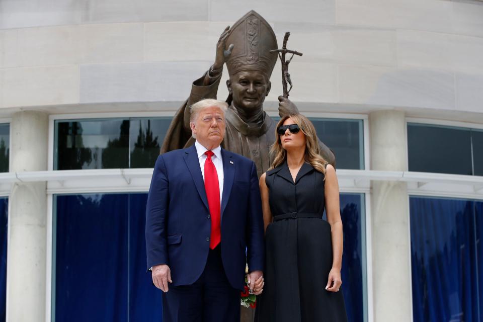 President Donald Trump and first lady Melania Trump visit Saint John Paul II National Shrine, June 2, in Washington. ((AP Photo/Patrick Semansky))