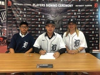 Venezuelan catcher Armando Lao signs with the Detroit Tigers on January 15, 2024.