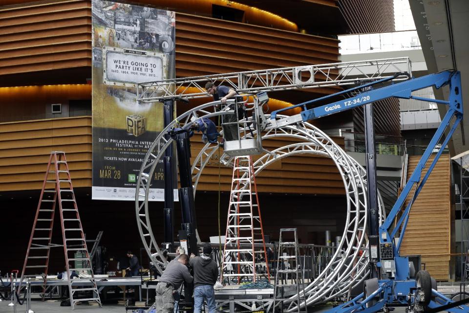 Workmen begin Preparations for the Philadelphia International Festival of the Arts 2013, at the Kimmel Center Tuesday, Feb. 19, 2013, in Philadelphia. The citywide festival is scheduled to run from March 28 to April 27. (AP Photo/Matt Rourke)