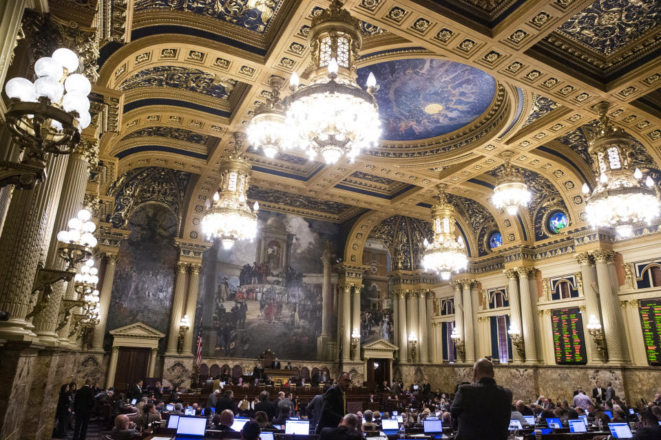 In this Nov. 19, 2019, photo is the Pennsylvania House of Representatives chamber at the Capitol in Harrisburg, Pa. It takes hundreds of millions of dollars a year for the Pennsylvania General Assembly to maintain what is one of the country's largest legislative staffs, a small army with a voracious appetite for food, shelter, transportation, office supplies and computer equipment. (AP Photo/Matt Rourke)