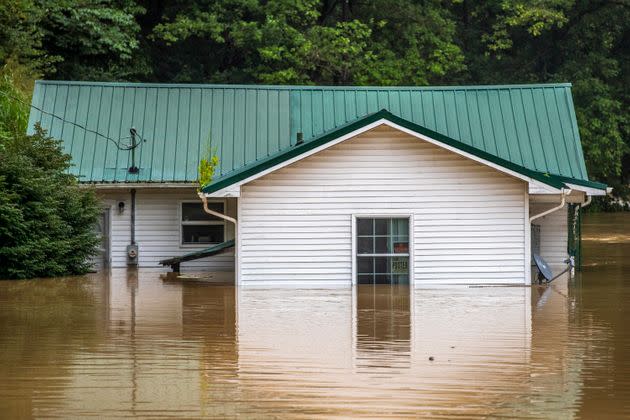 A flooded home in Lost Creek, Kentucky, on July 28. (Photo: Ryan C. Hermens/Lexington Herald-Leader via AP)