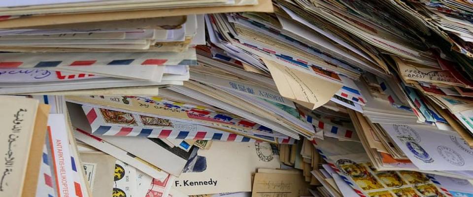 stacks of unopened mail