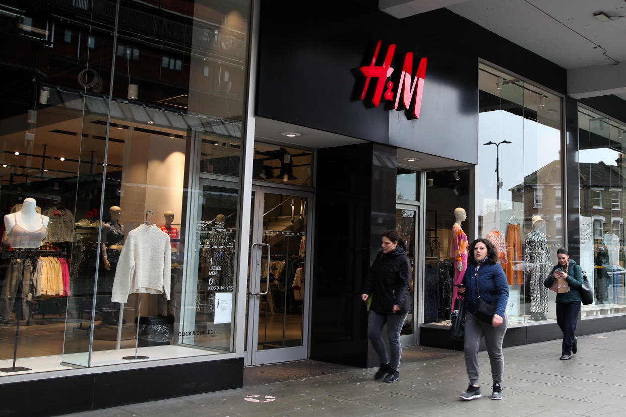 H&M People walk past a branch of H&M store. (Photo by Dinendra Haria/SOPA Images/LightRocket via Getty Images)