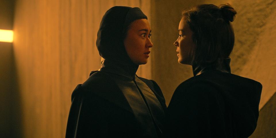 beatrice and ava in warrior nun, looking at each other in close proximity. beatrice looks shocked, while ava looks resigned