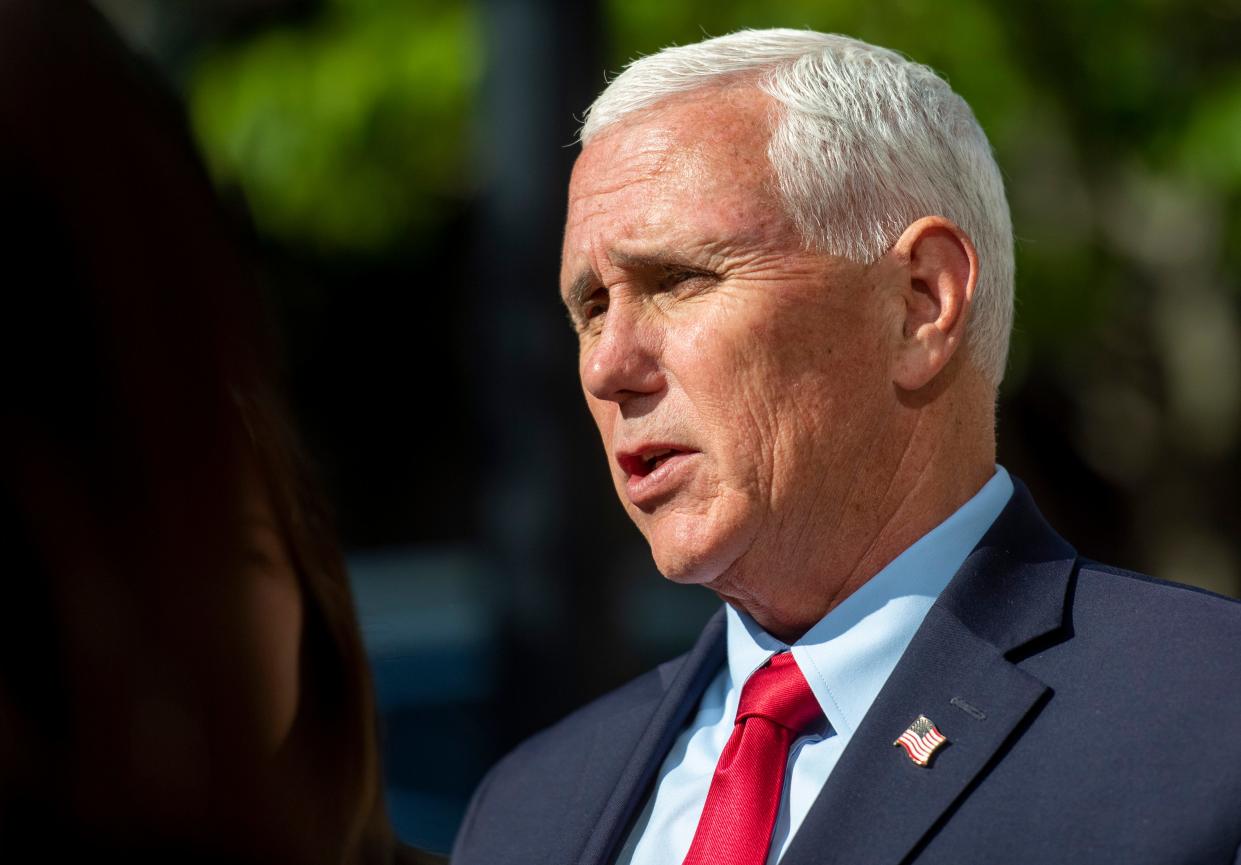 Former Vice President and Indiana Governor Mike Pence addresses the media on Main Street ahead of a fundraising event at Robert L. Koch II Science Center in Downtown Evansville, Ind., Wednesday, July 12, 2023.