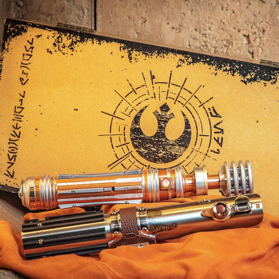 Collectibles available on Star Wars Day include the Skywalker Legacy Lightsaber Set ($375) with two lightsaber hilts with sound effects and lights up a saber blade (sold separately).