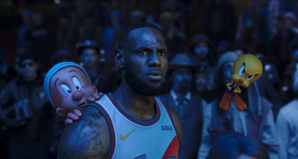 Basketball star LeBron James teams up with Elmer Fudd, Tweety Bird and other Looney Tunes characters for an epic hoops game in the live-action/animated film "Space Jam: A New Legacy."