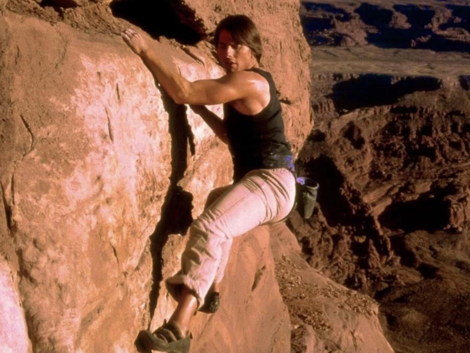 Tom Cruise climbing a mountain in "Mission: Impossible 2."