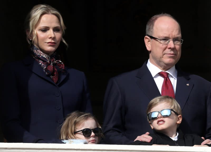 FILE PHOTO: Prince Albert II of Monaco, his wife Princess Charlene and their children Prince Jacques and Princess Gabriella stand on the palace balcony during the traditional Sainte Devote procession in Monaco