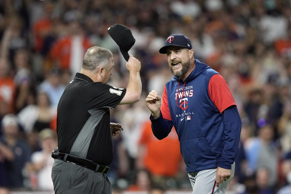 Minnesota Twins manager Rocco Baldelli argues with umpire Todd Tichenor during the fifth inning of a baseball game against the Houston Astros Tuesday, Aug. 23, 2022, in Houston. Baldelli was ejected from the game. (AP Photo/David J. Phillip)