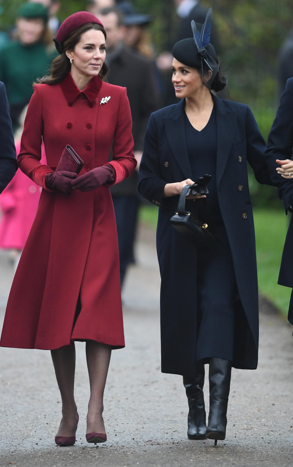 Kate and Meghan looked festive as they walked to the service [Photo: PA]