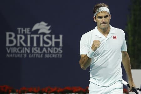 Mar 23, 2019; Miami Gardens, FL, USA; Roger Federer of Switzerland reacts after winning a point against Radu Albot of Moldova (not pictured) in the second round of the Miami Open at Miami Open Tennis Complex. Mandatory Credit: Geoff Burke-USA TODAY Sports