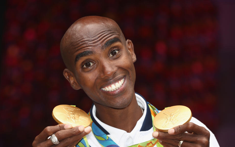 RIO DE JANEIRO, BRAZIL - AUGUST 21:  Mo Farah of Great Britain, the double Gold Medal poses at British House on August 21, 2016 in Rio de Janeiro, Brazil.  (Photo by David Rogers/Getty Images)