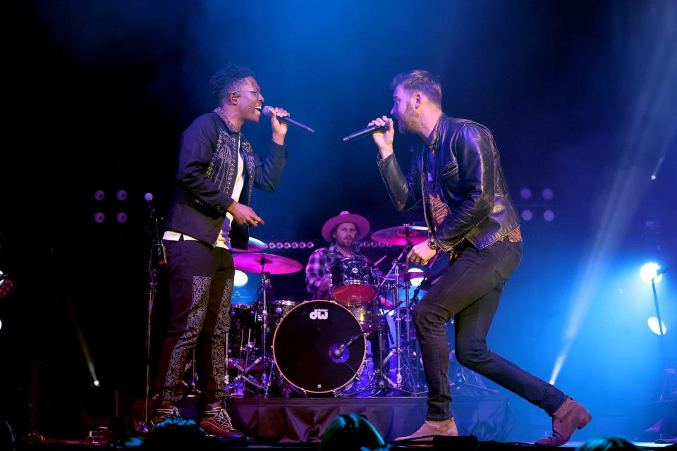 BRELAND and Charles Kelley perform onstage for "BRELAND & Friends" concert to benefit the Oasis Center, sponsored by Amazon Music at Ryman Auditorium on April 12, 2022 in Nashville, Tennessee. (Photo by Jason Kempin/Getty Images for "BRELAND & Friends" )