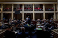 <p>Teachers from across Kentucky pack the gallery of the Senate chambers inside the state Capitol to rally for increased funding and to protest changes to their state funded pension system, Friday, April 13, 2018, in Frankfort, Ky. (Photo: Bryan Woolston/AP) </p>