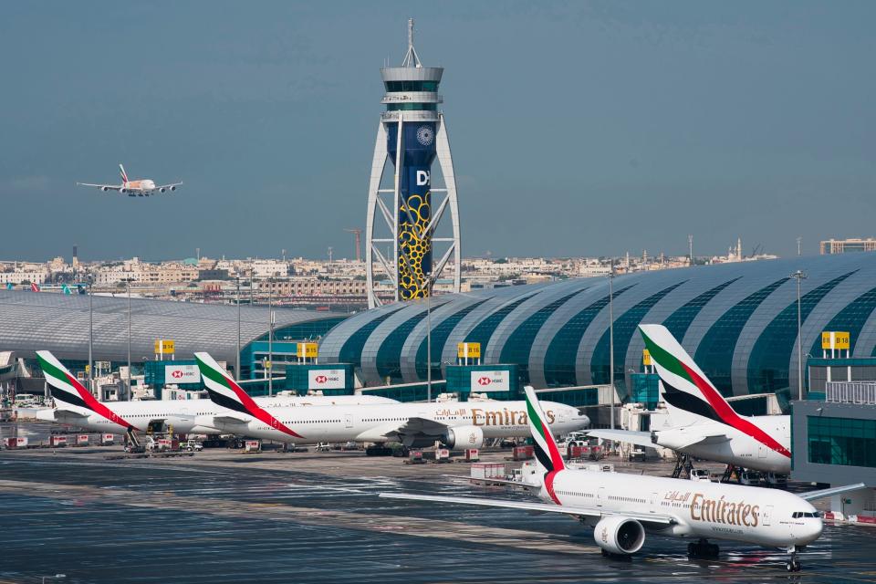 An Emirates jetliner comes in for landing at Dubai International Airport on Dec. 11, 2019.