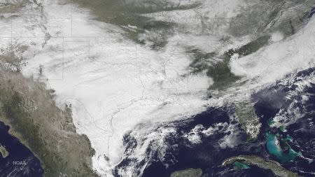 The weather system bringing winter weather to parts of the western and southern U.S. is seen in a NOAA GOES East satellite image taken at 2:45pm ET (19:45GMT) February 23, 2015. REUTERS/NOAA/Handout via Reuters