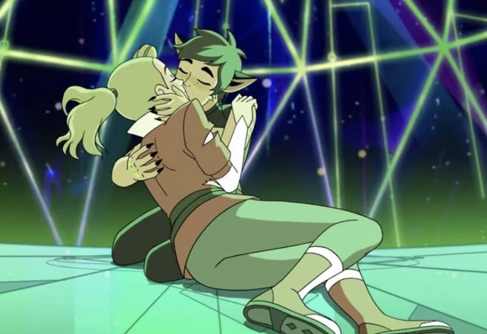 Animated characters Adora and Catra kissing