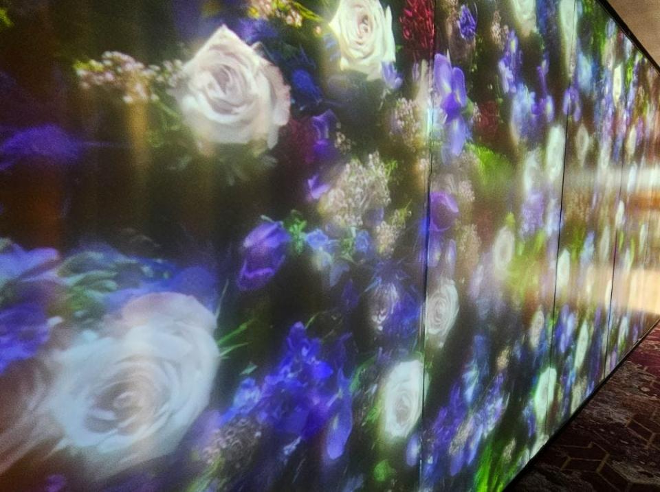 On the second level, a projection wall features a scene that changes every two hours and with the seasons at Ruth's Chris Steak House in West Des Moines.