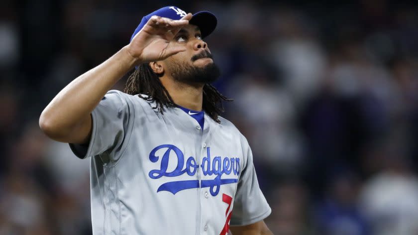 Los Angeles Dodgers relief pitcher Kenley Jansen gestures after striking out Colorado Rockies pinch-hitter Garrett Hampson for the final out of a baseball game Saturday, April 6, 2019, in Denver. The Dodgers won 7-2. (AP Photo/David Zalubowski)