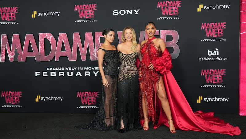 Isabela Merced, from left, Sydney Sweeney and Celeste O'Connor arrive at the premiere of "Madame Web," Monday, Feb. 12, 2024, at the Regency Village Theatre in Los Angeles.