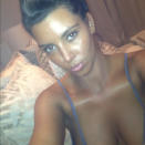 Celebrity photos: Kim Kardashian went all TOWIE on us this week by slapping on a lot of fake tan and tweeting a picture of the results. She tweeted the photo along with the caption: “The tannerexic mom has some serious competition!!! LOL” [sic]