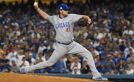 Oct 15, 2017; Los Angeles, CA, USA; Chicago Cubs starting pitcher John Lackey (41) pitches against the Los Angeles Dodgers in the ninth inning during game two of the 2017 NLCS playoff baseball series at Dodger Stadium. Mandatory Credit: Jayne Kamin-Oncea-USA TODAY Sports